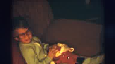 Pennington New Jersey (1954): A Man Puts A Hat On His Son Then He Takes A Picture