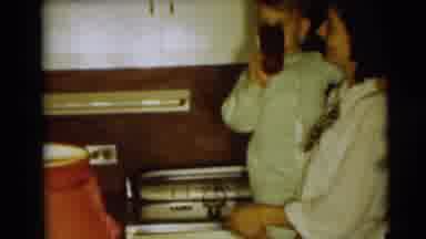 Pennington New Jersey (1954): Boy Wearing Green Pajamas Drinks From Red Cup While