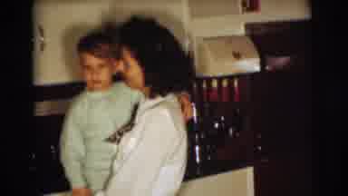 Pennington New Jersey (1954): A Young Mother Holds A Toddler Boy In Pajamas As He