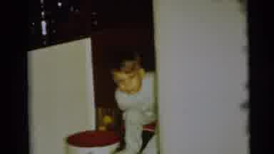 Pennington New Jersey (1954): Child Playing Hide-And-Seek Behind A Mobile