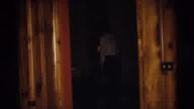 Pennington New Jersey (1954): A Woman Holding Shoes While Walking Indoors While