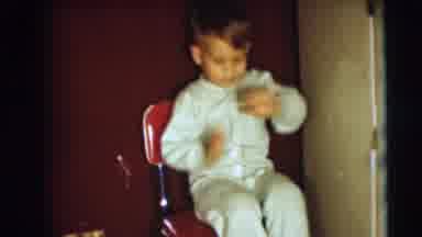 Pennington New Jersey (1954): Little Boy Sitting In A Tall Red Chair Then Hopping