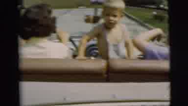 Pennington New Jersey (1955): Two Women With A Child In Between Them Driving Away