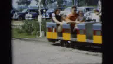 Pennington New Jersey (1955): Clown At Amusement Park Waving At A Small Train With