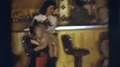 Pennington New Jersey (1955): Woman Wearing White Shirt Puts On Black Cowboy Hat