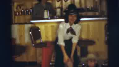 Pennington New Jersey (1955): Mom And Young Son Playing Cowboy Together On Toy
