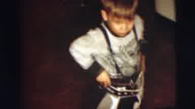 Pennington New Jersey (1955): Boy Plays In The Kitchen Of His Residence Under The