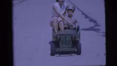 Pennington New Jersey (1955): Child With Mother Playing Soldier And Driving Toy