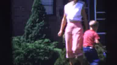 Pennington New Jersey (1955): A Man Is Walking Towards A Woman Who Is Wearing A