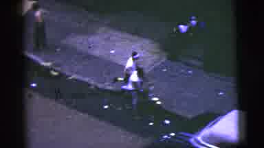 New York City (1956): Man In White Runs Down The Sidewalk Then Turns To See If