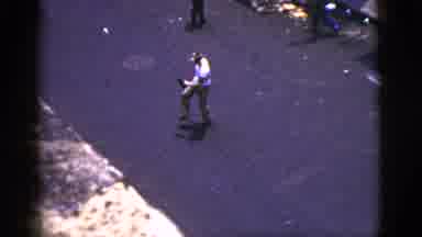 New York City (1956): A Caucasian Man Plays Catch In The Middle Of A City Road