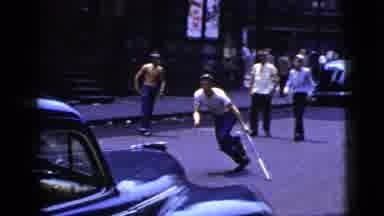 New York City (1956): Boys Play In The Street With Friends With A Lot Of Joy And