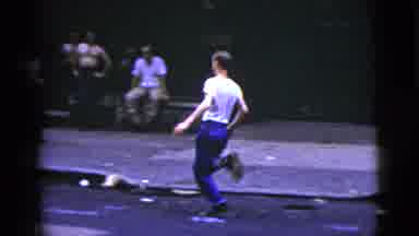 New York City (1956): Man Running Down The Street In A City