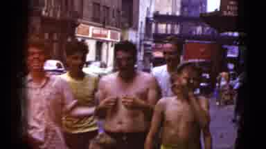 New York City (1956): Man Wearing Blue Shirt Walks With Black Dog On A Bright