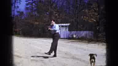 New York City (1956): Man And Boy Play Catch While Dog Walks Around Near Man