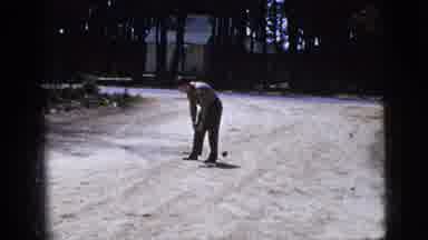 New York City (1956): Man Drops Small Ball And Runs To Pick It Up