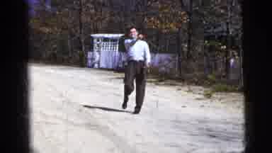New York City (1956): Two Men Playing Catch In The Street One Is Wearing A Suit