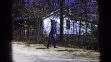 New York City (1956): A Man In A Suit Starting To Run