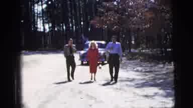 New York City (1956): Three People Walk Towards Something As A Car Follows Them