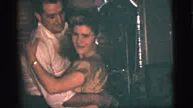 New York City (1956): Man And Woman Dancing Together While Other People Watch Them