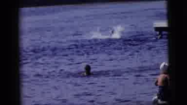 New York City (1958): People Jumping Swimming And Playing In A Lake During The