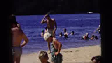 New York City (1958): Crowds Of People Swimming And Playing In The Calm Waters Of