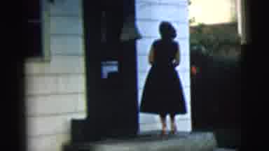 New York City (1958): Lady In A Black Dress Arrives At A House And Goes Inside