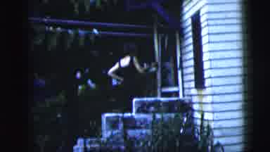 New York City (1958): Man Wearing Blue Shirt Holds Arms Of Woman Wearing Black