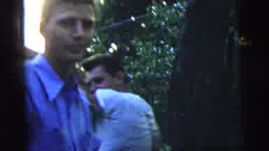 New York City (1958): Two Guys One Dragging Something Across A Clothesline The
