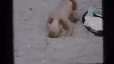 New York City (1958): Child Playing On The Sand With Woman Close By Observing