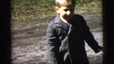 New York City (1958): A Boy Standing Turning Around And Clapping All Happy