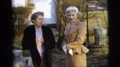 New York City (1958): Slightly Surprised Ladies Of The Past Talking Outside First
