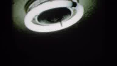 New York City (1958): Round Tubular Fluorescent Light On Ceiling Turned On Camera