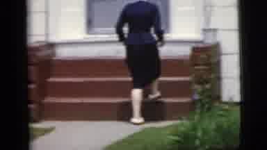 New York City (1958): Woman Going Upstairs Then Looking Back And Waving As She