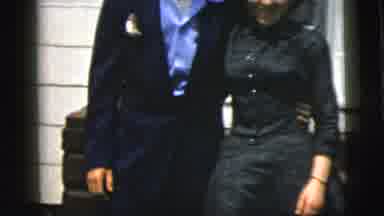 New York City (1958): A Couple In Dress Clothes Walk Away From A House And Then