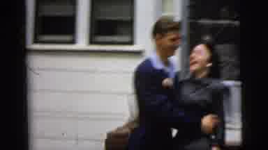 New York City (1958): Man And Women Wearing Formal 90'S Attire With Flower Piece