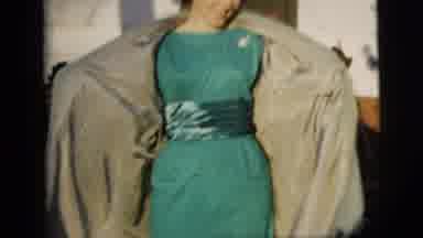 New York City (1958): Woman Shows Off Her New Dress With Joy On A Typical Spring