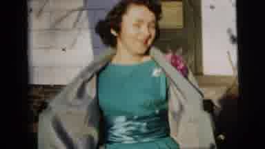 New York City (1958): Man Then Women Strutting Towards Camera Smiling With Coat