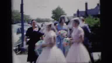 New York City (1958): Bride Standing Outside Car During Wedding Preparation