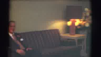 SAINT LOUIS MISSOURI-1959: Video Of A Man Sitting On A Couch In A Funeral Home