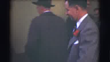 Saint Louis Missouri (1959): A Man In A Suit Looks At Another Man And Laughs