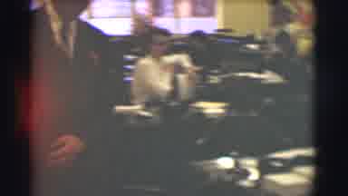 Saint Louis Missouri (1959): Men Wearing Black Suits Walk Through Room Full Of