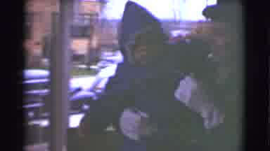Saint Louis Missouri (1959): Woman Holding Child In Front Of Others Inside A