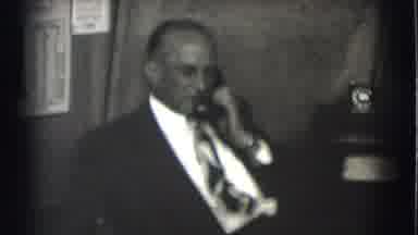 Saint Louis Missouri (1959): Man Speaks On The Phone In An Office In A Working