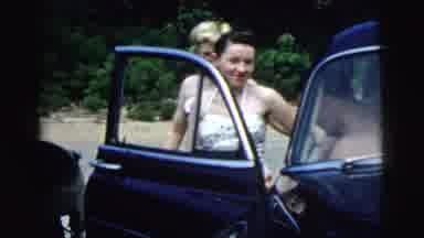 Camden New Jersey-1961: Young Woman In Polka-Dot Swimsuit Exits Car At Lakeside Beach