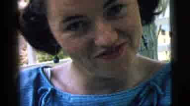 Camden New Jersey (1961): Woman With Blue Earring Smiling And Laughing At Camera