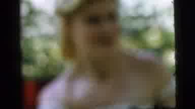 Camden New Jersey (1961): Man Records Two Women Sitting At A Table Nearby At A