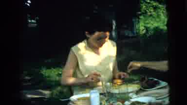 Camden New Jersey (1961): Two Women Sit At A Table Eating A Meal In A Grassy