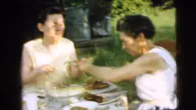 Camden New Jersey (1961): A Young Lady Grabbing Delicious Food Items And Putting