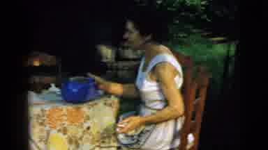 Camden New Jersey (1961): Boy Outside His Home Makes A Meal Accompanied By His